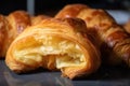 homemade croissant, flaky and golden brown on the outside with soft and buttery interior