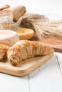 Homemade croissant on wood block, fresh bakery