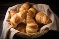 homemade croissants in a basket, ready to be baked