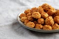 Homemade Crumbly Biscuits with Parmigiano Reggiano on a Plate, side view. Copy space