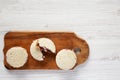 Homemade Crustless Peanut Butter and Jelly Circles on a rustic wooden board, top view. Flat lay, overhead, from above. Space for