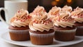 Homemade cupcake with chocolate icing, a sweet indulgence for celebration generated by AI Royalty Free Stock Photo