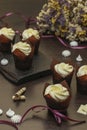 Homemade cupcakes with cream on a dark background, Concept for Valentine`s Day, Birthday and Father`s day