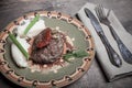 Homemade cutlet with mashed potatoes on a plate on old wooden ta