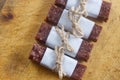 Homemade date bars on the wooden board