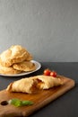 Homemade Deep Fried Italian Panzerotti Calzone with sauce, side view. Space for text Royalty Free Stock Photo