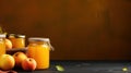 Homemade delicious apple compote in a glass jar. Appetizing peach jam in jars on a dark background with space for text Royalty Free Stock Photo