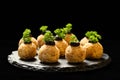 Homemade delicious ball appetizer with chicken, cheese, eggs and walnuts, decorated with parsley and olive slices, served on Royalty Free Stock Photo