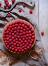 Homemade delicious chocolate cake cheesecake with raspberries on the rustic wooden table. Royalty Free Stock Photo