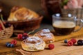 Homemade delicious cinnamon rolls with coffee and cinnamon sticks selective focus