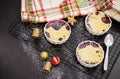 Homemade delicious crumble with berries in portioned individual