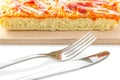 Homemade delicious fresh a slice of pizza on wooden plate. Royalty Free Stock Photo