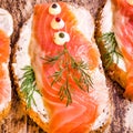 Homemade delicious sandwich with Smoked Salmon garnished with gr Royalty Free Stock Photo