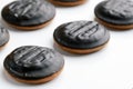 Homemade delicious shortbread cookies covered in chocolate next to each other on a white background. Concept of making desserts Royalty Free Stock Photo