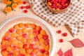 Homemade delicious sweet apricot pie served with raspberries on a table, top view Royalty Free Stock Photo