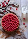 Homemade delicious tiramisu cake with fresh raspberries and lemonade on the rustic wooden table. Royalty Free Stock Photo