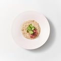 Homemade diet oatmeal porridge with spinach and lowfat ham. Royalty Free Stock Photo