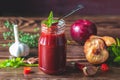 Homemade DIY natural canned hot plum sauce chutney with chilli or tkemali in glass jar Royalty Free Stock Photo