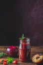 Homemade DIY natural canned hot plum sauce chutney with chilli or tkemali in glass jar Royalty Free Stock Photo