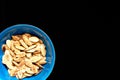 Overhead view of unshelled roasted pumpkin seeds Royalty Free Stock Photo