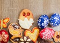 Homemade easter confectionery sugar with eggs on wood background