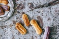 Homemade eclairs in colored glaze o