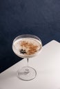 Homemade Eggnog with cinnamon and nutmeg in martini glass. Royalty Free Stock Photo