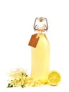 Homemade elderflower syrup in a bottle.