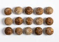 Homemade energy balls with dried apricots, raisins, dates, prunes, walnuts, almonds and coconut. Healthy sweet food. Energy balls