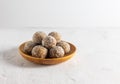 Homemade energy balls with dried apricots, raisins, dates, walnuts, almonds and coconut. Healthy sweet food. Royalty Free Stock Photo