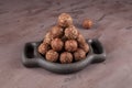 Homemade energy balls with nuts and dates. Healthy food for children and vegan, sweets substitute