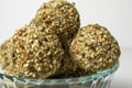 Homemade energy balls with nuts and sesame seeds on white background Royalty Free Stock Photo