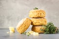 Homemade English scones or buttermilk biscuits with cheese, thyme and pieces of cheese