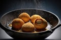 falafel balls made from chickpea flour in a pan with hot fat. Created with Generative AI technology.