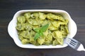 Homemade Farfalle Pasta with Pesto Sauce on Wooden Table Royalty Free Stock Photo