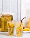 Homemade fermented kombucha tea drink with lemon and ginger