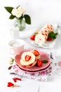Homemade festive Swiss roll with strawberries and cream. Selective focus.