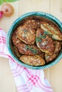Homemade fishcakes in rustic plate Royalty Free Stock Photo