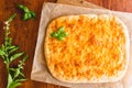 Homemade flat bread with cheese and basil