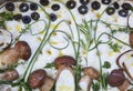 Homemade focaccia bread with Boletus Edulis porcini mushroom decorated with aromatic herbs and black olives.