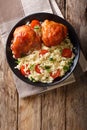 Homemade food: baked chicken thighs with garnish of rice close u Royalty Free Stock Photo