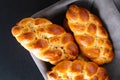 Homemade food concept fresh baked bread braid challah dough in bread basket with copy space Royalty Free Stock Photo