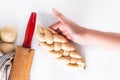 Homemade food concept process braiding bread braid challah dough on white background with copy space Royalty Free Stock Photo