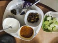 Homemade food delicious healthy salad vegetables curd plate spoon