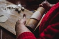 Making traditional Polish pierogi. Rolling dough.