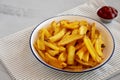 Homemade French Fries with Ketchup on a Plate, side view. Close-up Royalty Free Stock Photo