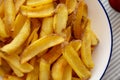 Homemade French Fries on a Plate, top view. Flat lay, overhead, from above. Close-up Royalty Free Stock Photo