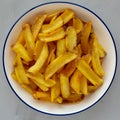 Homemade French Fries on a Plate, top view. Flat lay, overhead, from above. Close-up Royalty Free Stock Photo