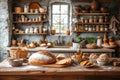 homemade fresh and big loaf of bread and ingredients in cozy rustic kitchen. food composition Royalty Free Stock Photo