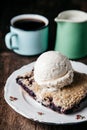 Homemade fresh blueberry pie with ice-cream on rustic background Royalty Free Stock Photo